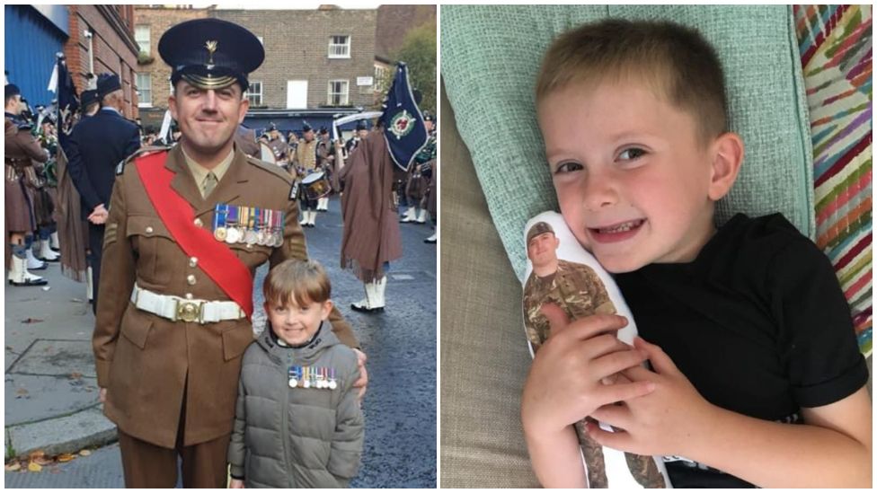 two pictures one with Matthew Evans in formal uniform standing by ollie who has medals on his coat. Another of ollie holding a cut out photo of his dad in uniform