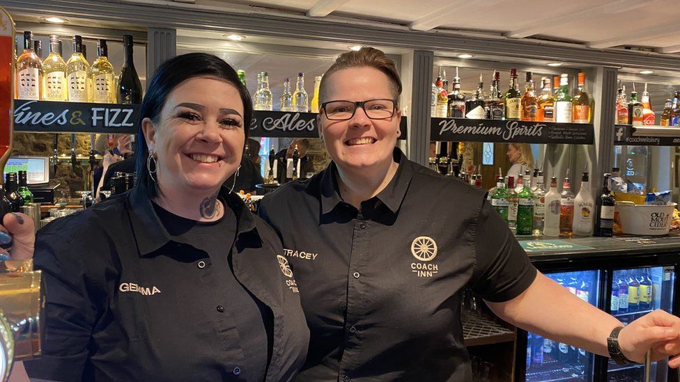 The two new managers of the Coach Inn in Lesbury, Northumberland behind the bar