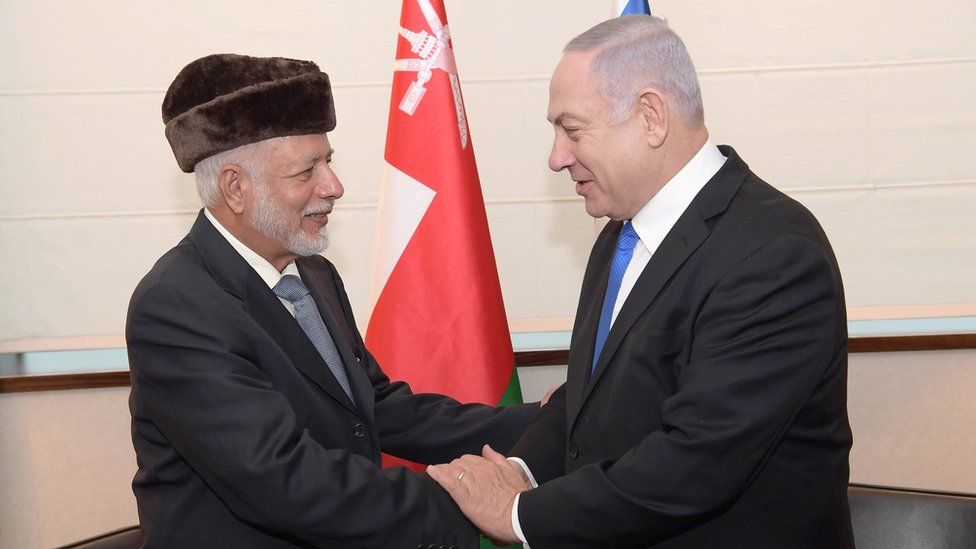 Oman's Minister of State for Foreign Affairs, Yusuf bin Alawi bin Abdullah (L), shakes hands with Israeli Prime Minister Benjamin Netanyahu (R) prior to a meeting in Warsaw, Poland on 13 February 2019