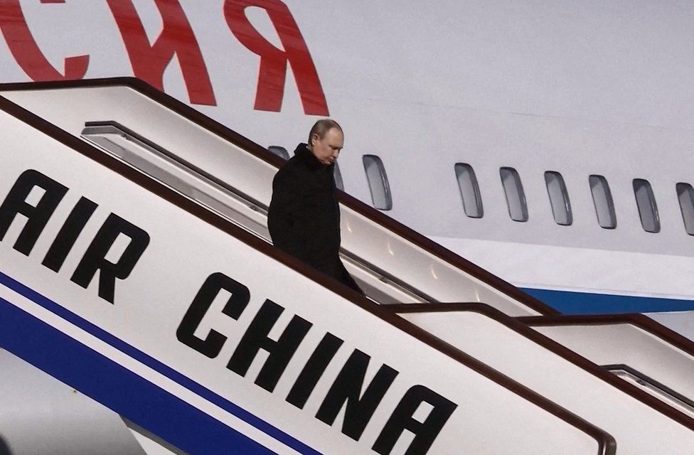 Russia's President Vladimir Putin disembarking upon his arrival in Beijing on February 4, 2022, ahead of his meeting with China's president and the opening ceremony of the 2022 Winter Olympic Games