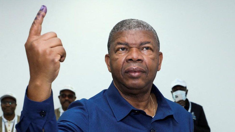 Angola's President and leader of the People's Movement for the Liberation of Angola (MPLA) ruling party Joao Lourenco gestures after casting his vote in a general election in the capital Luanda, Angola August 24, 2022