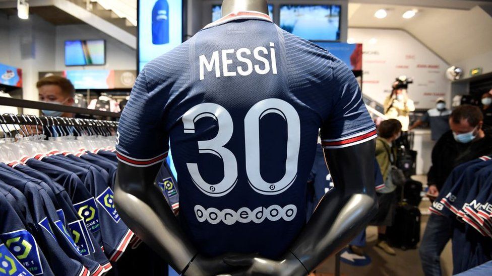 A Lionel Messi shirt for sale at the Paris-Saint-Germain (PSG) club store on the Champs Elysees avenue in Paris