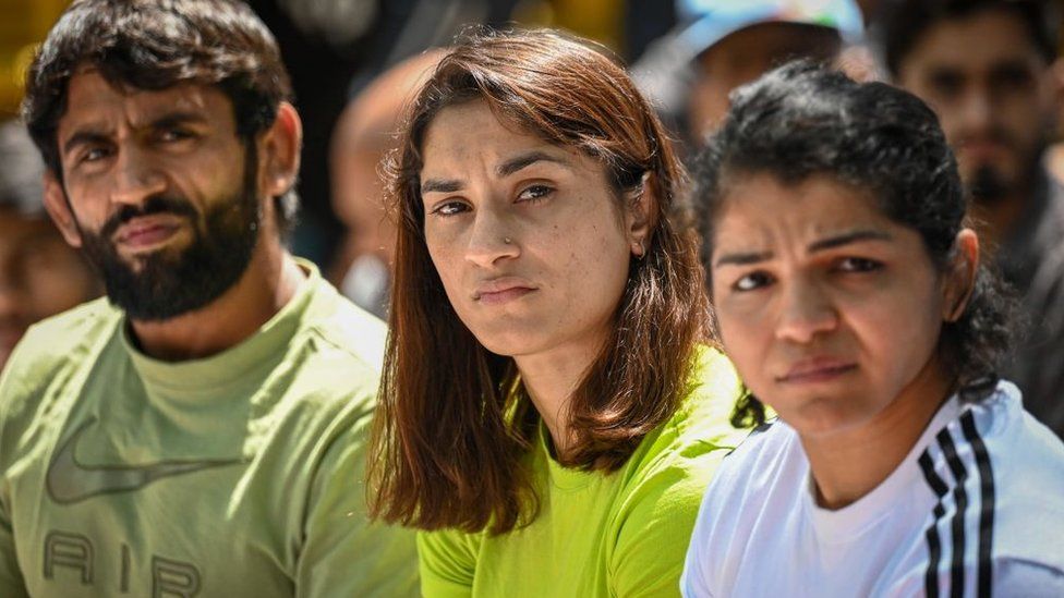 Indian Wrestlers Bajrang Punia, along with Vinesh Phogat and Sakshi Malik addresses a press conference during their ongoing protest against Wrestling Federation of India's President at Jantar Mantar on April 25, 2023 in New Delhi, India.