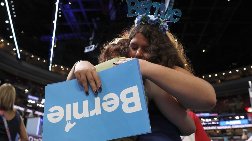 Bernie supporters hug after his speech