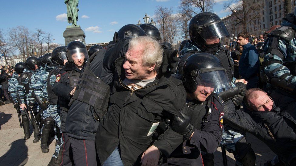 Police detain protesters in Pushkin Square, downtown Moscow