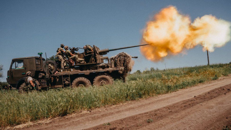 Ukrainian soldiers from the 60th Battalion of Territorial Defense, are shooting rounds into Russian positions with an S60 anti-aircraft canon placed on a truck, outside Bakhmut, Ukraine on June 19, 2023.