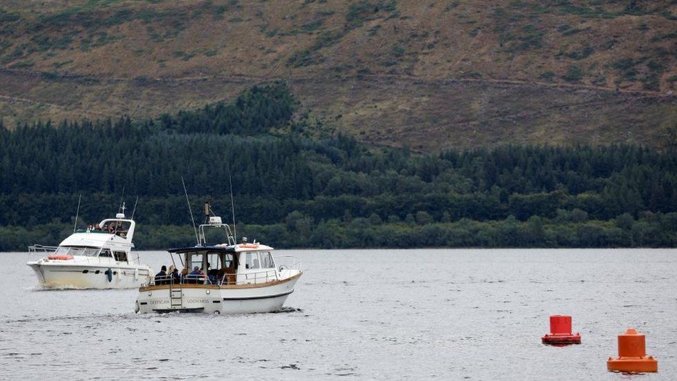 Boats scouring Loch Ness