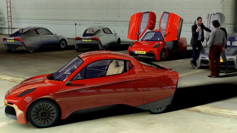 Riversimple Rasa cars in garage - with people talking in the rear of the picture