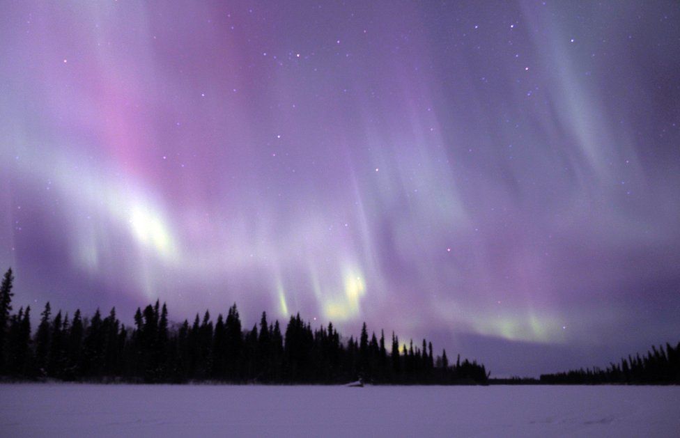 The Northern Lights light up the sky