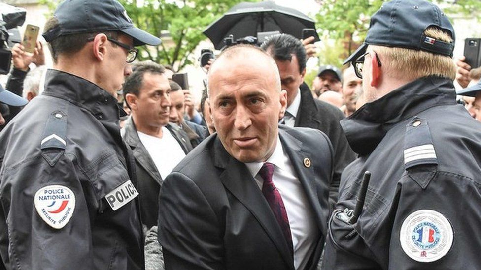 Kosovo's former Prime Minister Ramush Haradinaj (C) in Colmar, eastern France