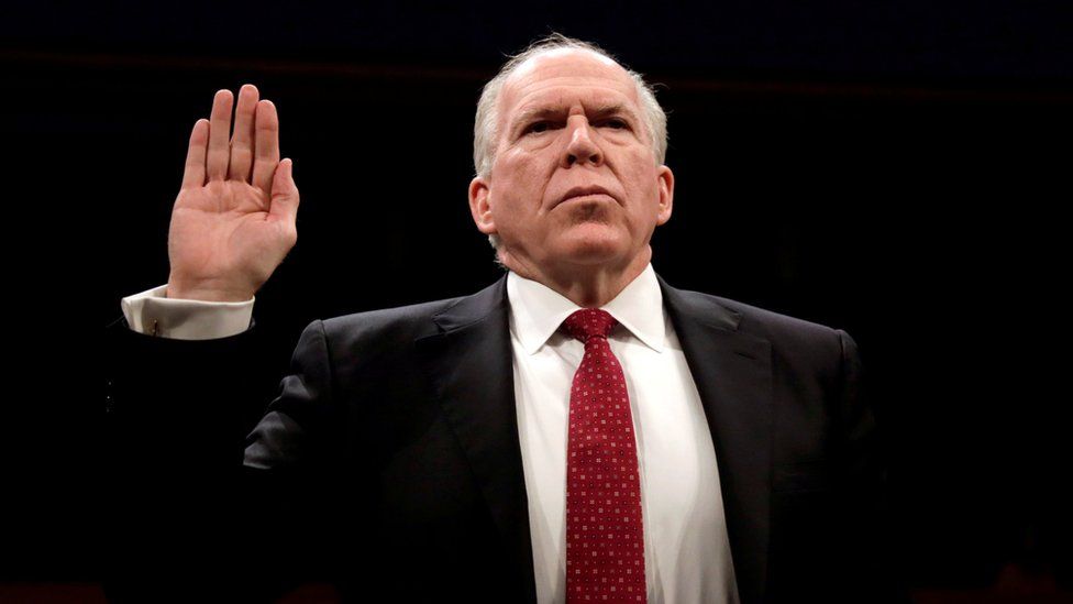 Image shows Former CIA director John Brennan being sworn in to testify in Congress