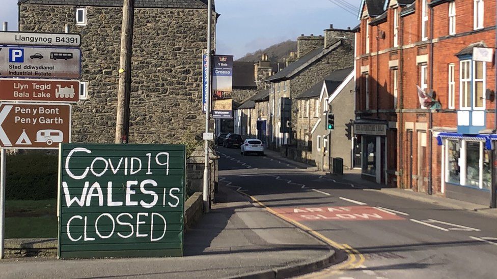 A sign in Bala tells visitors "Wales is closed"