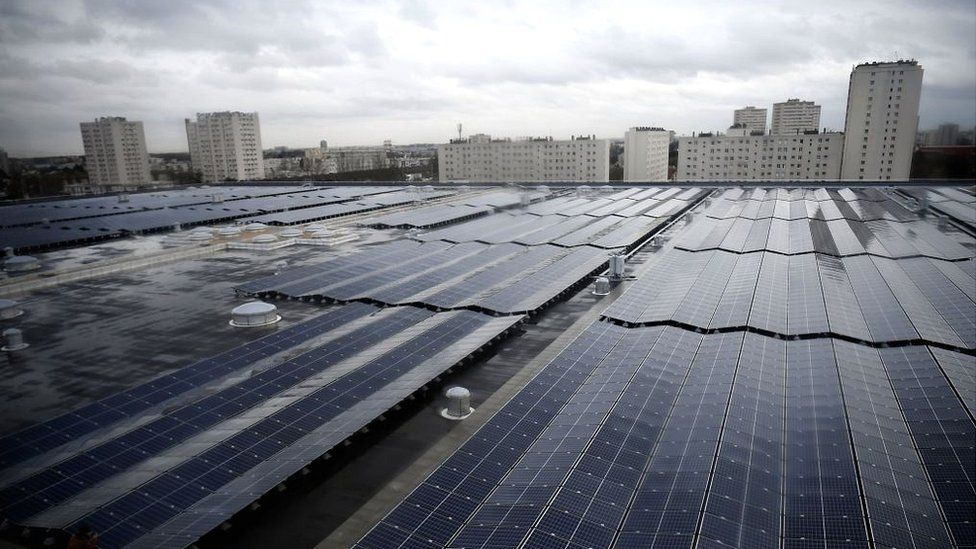 The largest photovoltaic power plant on a rooftop in the Ile de France region is pictured during its inauguration on the roof of the drinking water reservoir in L'Hay-les-Roses, south of Paris, on December 14, 2017