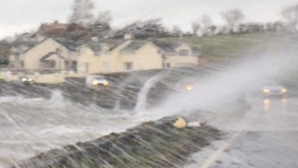 Waves batter the Portaferry Road on the Ards Peninsula