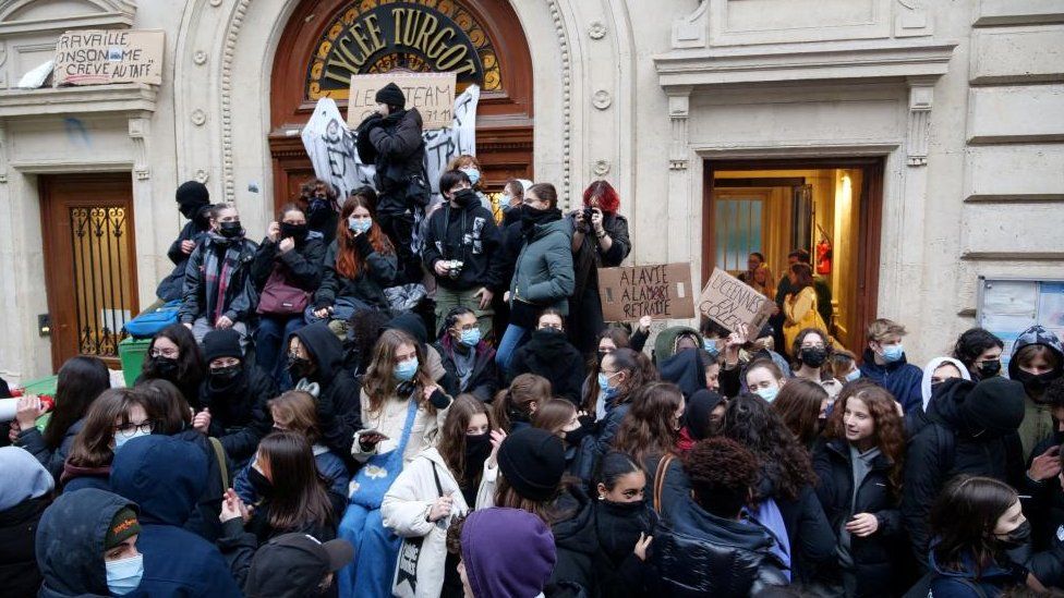 French high school students block the access to the Lycee Turgot highschool in Paris during a nationwide day of strike and protests against French government's pension reform plan in France, January 31, 2023