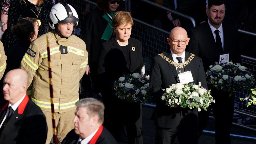 Lord Provost Robert Aldridge and First Minister Nicola Sturgeon arrive for the funeral