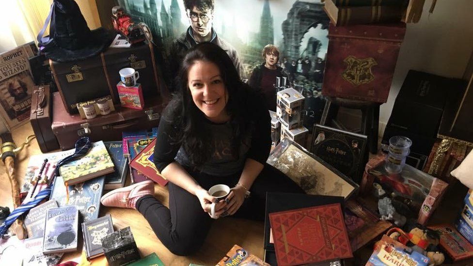Victoria Maclean in font of some of her Harry Potter memorabilia