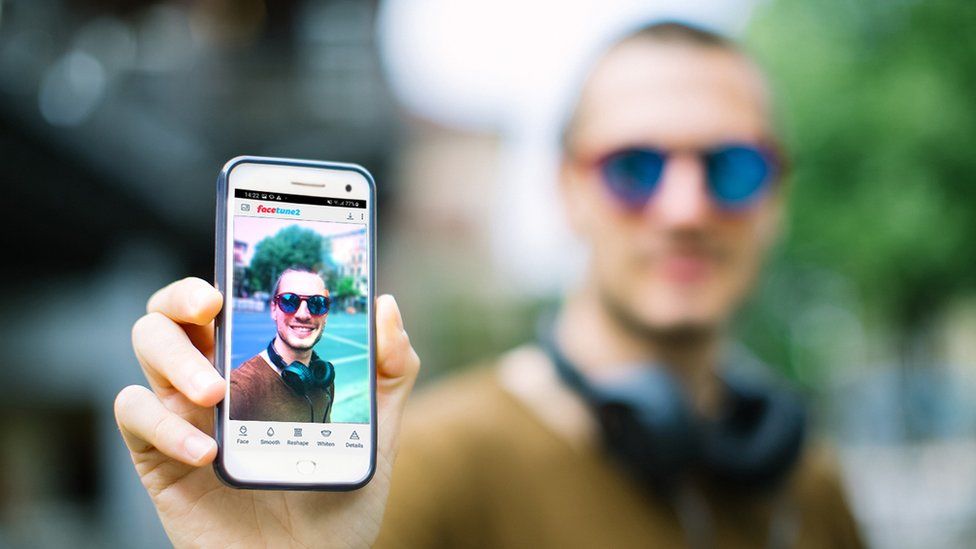 A man using FaceTime