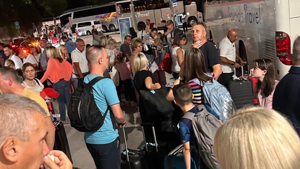 Caryn Savazzi took a photo of the crowds of stranded tourists as they arrived into Rhodes