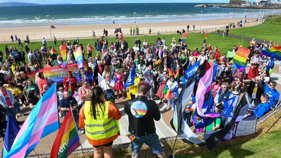 Speakers address a crowd on Portrush's West Strand on Saturday.