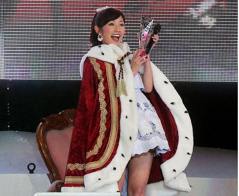 AKB48 member Mayu Watanabe celebrates after being elected to the first place in the group's general election in Ajinomoto Stadium in Tokyo on 7 June 2014.