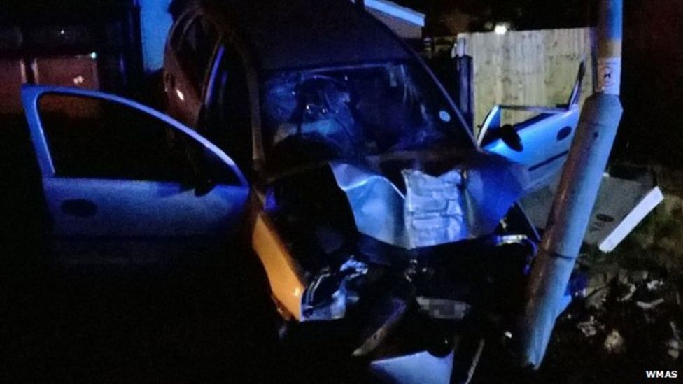 Crashed car lands on parked car in Birmingham - BBC News