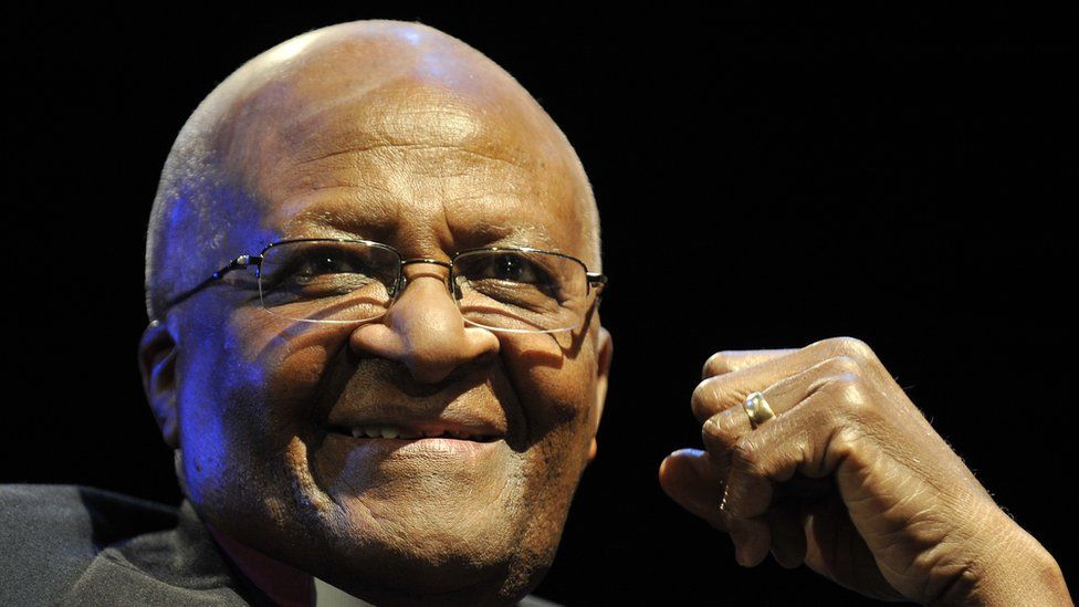 Desmond Tutu speaking to a conference