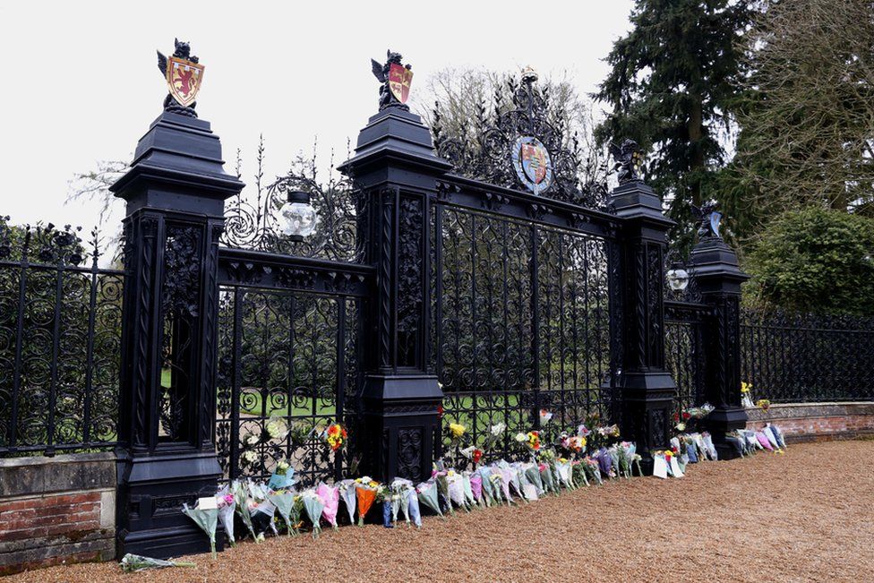 Flowers are seen at the gates to Sandringham House on the royal Sandringham Estate in Norfolk on April 10, 2021 in Sandringham, United Kingdom.