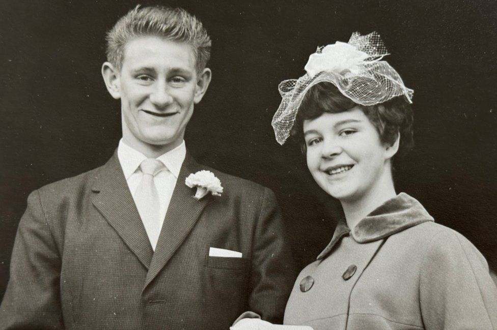 Black and white picture of a young couple on their wedding day