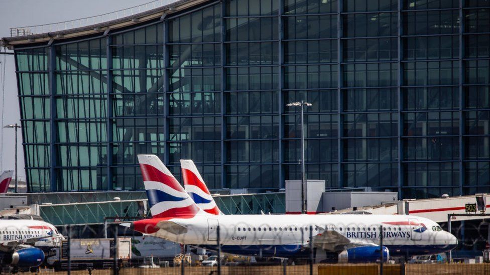 British Airways craft  are prepared for take-off extracurricular  Terminal 5 astatine  Heathrow Airport.