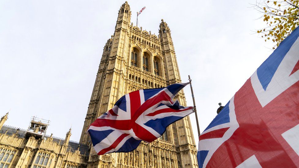 British flags fly outside the Houses of Parliament in London, 30 October 2019