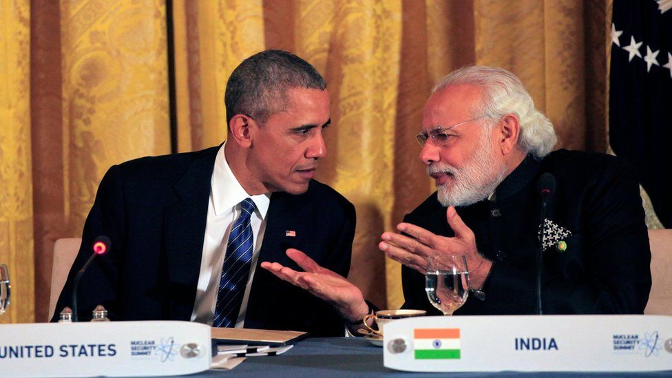 U.S. President Barack Obama talks to Prime Minister Narendra Modi of India a working dinner with heads of delegations at the Nuclear Security Summit March 31, 2016 in Washington, DC