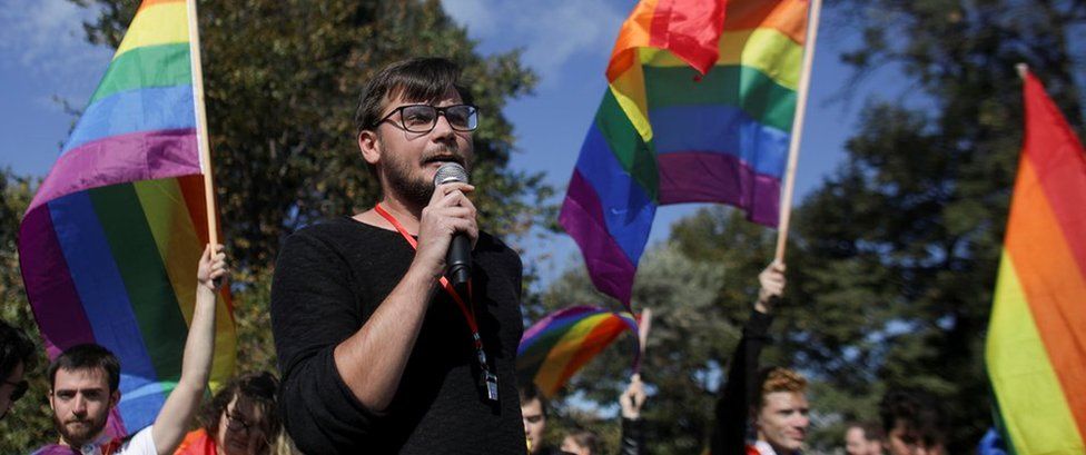 Vlad Viski of LGBT rights group Mozaiq delivers a speech during a protest against the referendum regarding proposed changes to the constitution that would prevent future recognition of same-sex marriages, in Bucharest, Romania, September 30, 2018.