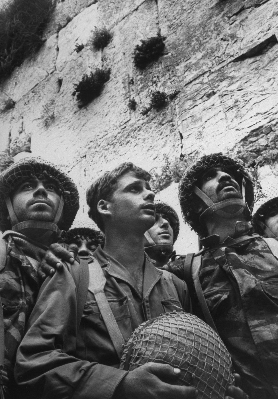 Israeli paratroopers gaze at Western Wall moments after recapture of Jewish holy site in Six-Day War, 1967