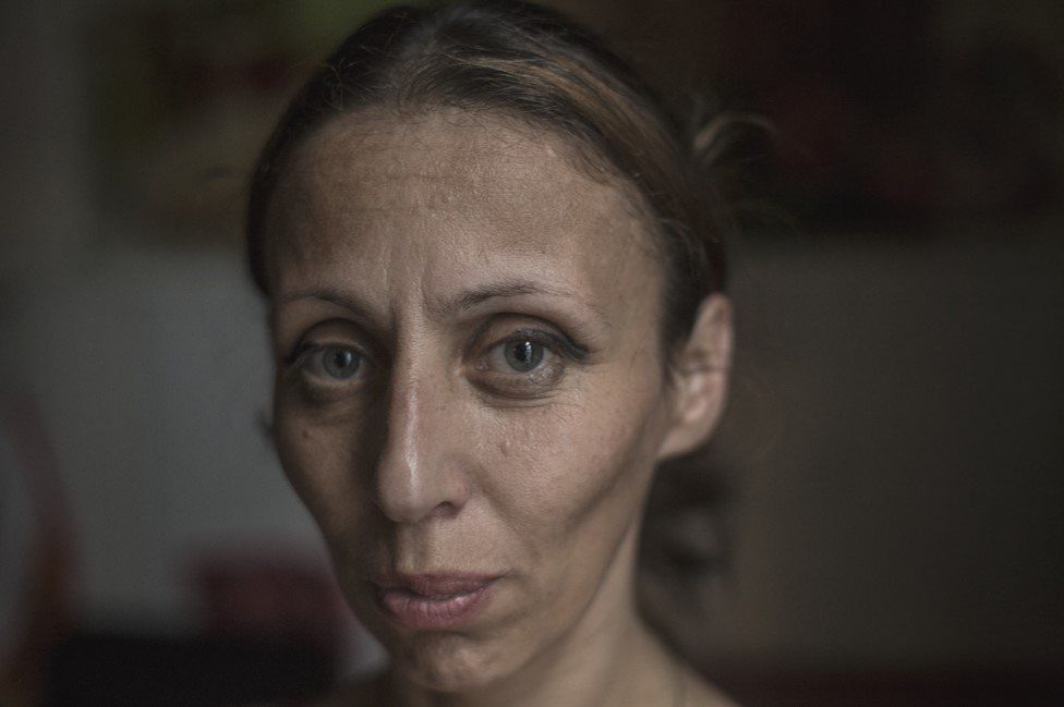 Ia Ochiauri, 42, a mother of two lives with her husband and his brother . They do odd jobs when they can