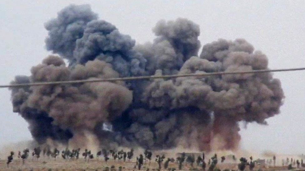 An image made from video shows smoke rising after airstrikes in Kafr Nabel of the Idlib province, western Syria, Thursday, Oct. 1, 2015.