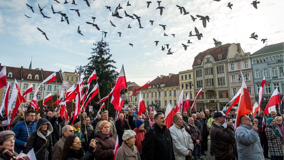 People attend a demonstration in support of the new Polish government and Polish President Andrzej Duda under the motto "Defending good changes" and organized by the national environment, right-wing and patriotic groups at the Old Market in Bydgoszcz, Poland, 19 December 2015.