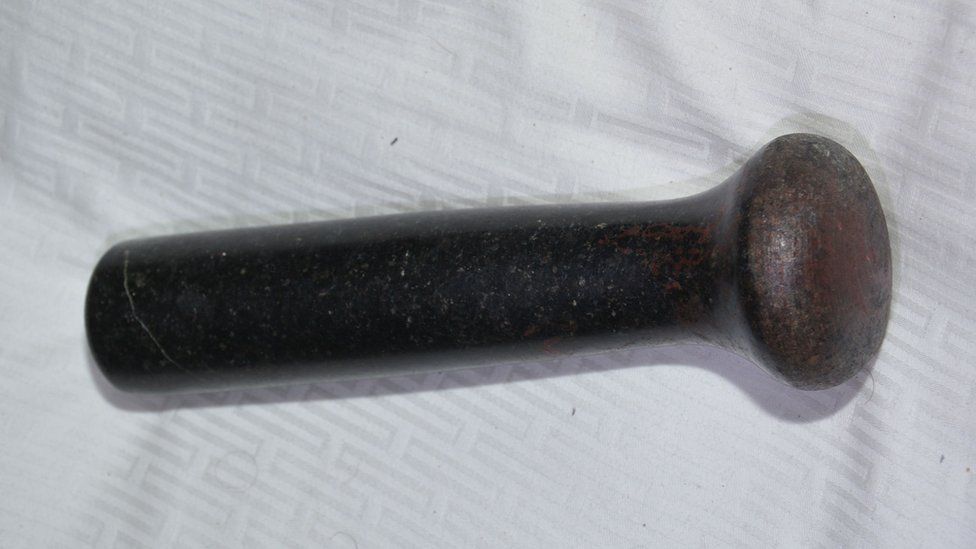 A black pestle, the murder weapon used on Christina Abbotts, 29, who was found dead in a bed in Crawley