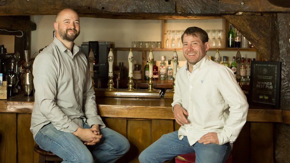 Landlord Martin Robinson and head chef Ian Baulsh are two thirds of the management team of Ye Olde Fighting Cocks