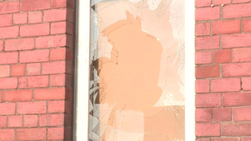 Two bricks were thrown at the house, smashing a front room window