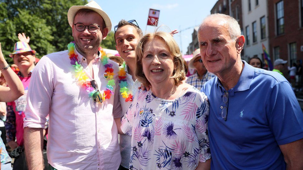 Mary McAleese with her husband Martin, her son Justin and his husband Fionan during the Pride parade in Dublin