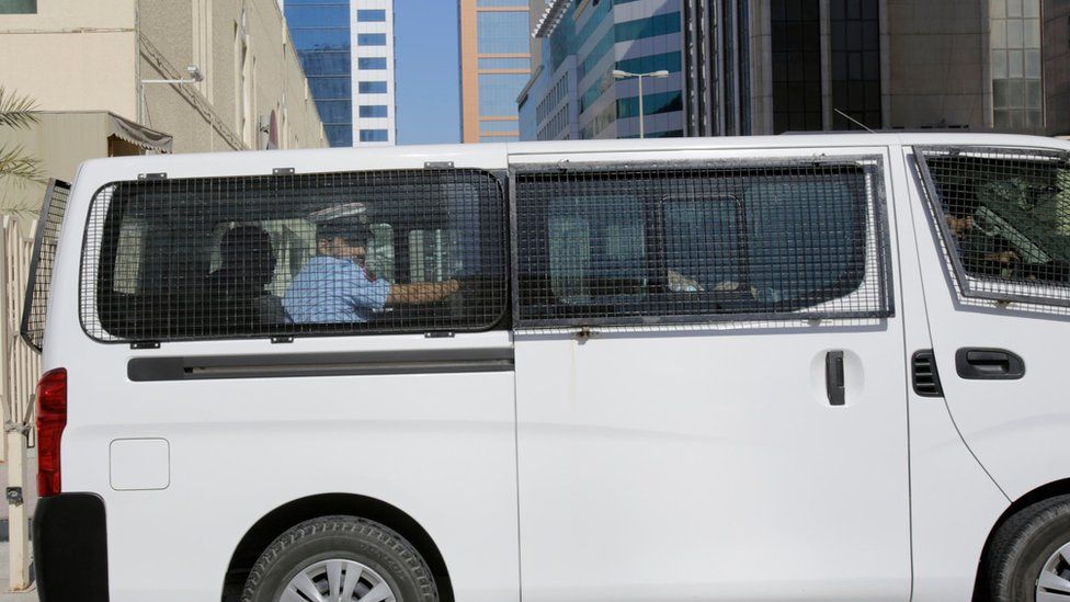 A prison van believed to be carrying some of the four detained American journalists leaves the Public Prosecution offices in Manama, Bahrain, (16 February 2016)