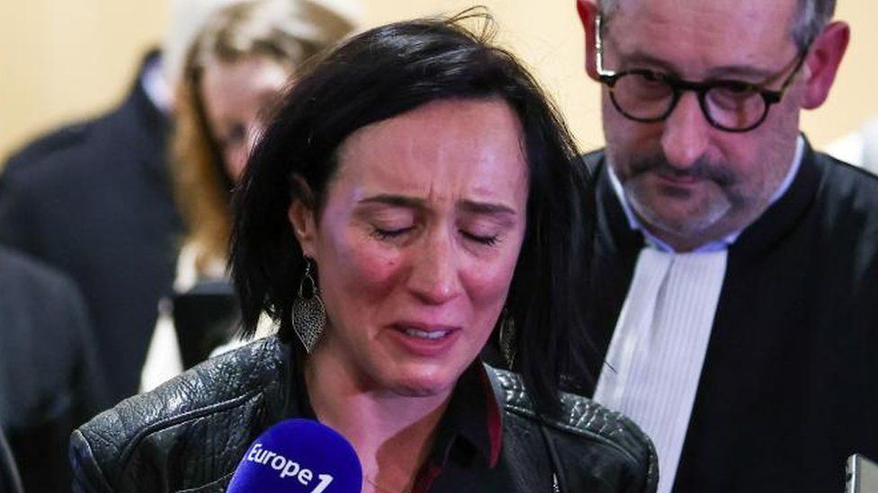Ophelie Touillou, sister of a victim of a crash, reacts as she talks to the press on the verdict's day in the trial relating to the crash of the Rio-Paris flight AF447 in 2009, at the Palais de Justice in Paris, France, 17 April 2023.