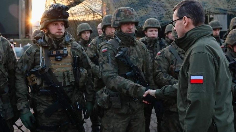 Polish Prime Minister Mateusz Morawiecki visited troops on the border early on Tuesday