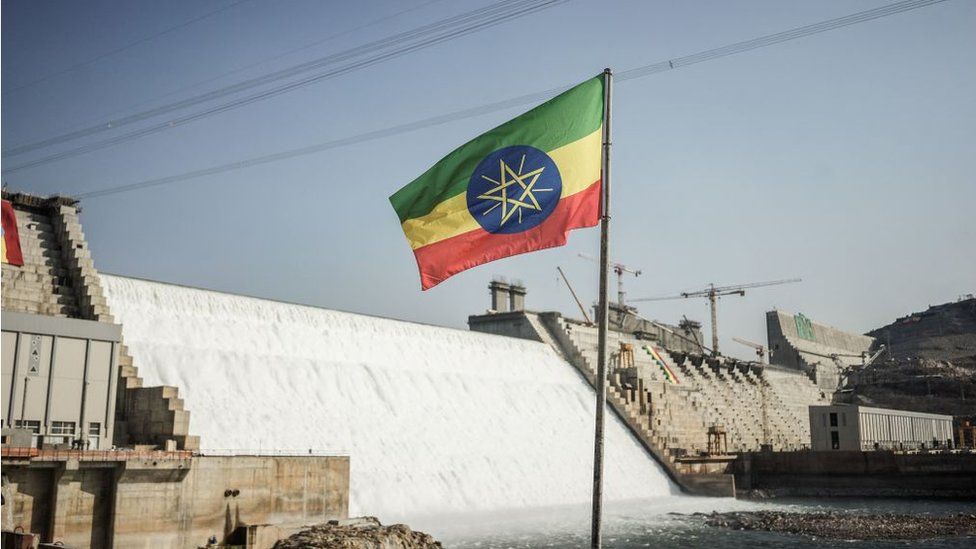 Ethiopian flag in front of the Grand Ethiopian Renaissance Dam (Gerd)