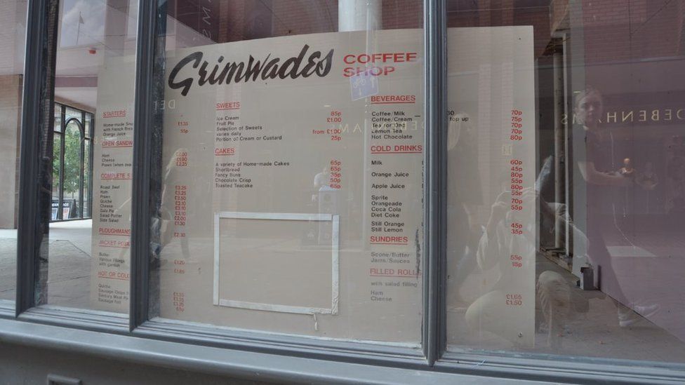 An old price list on display in the window of the former Grimwades building in Ipswich
