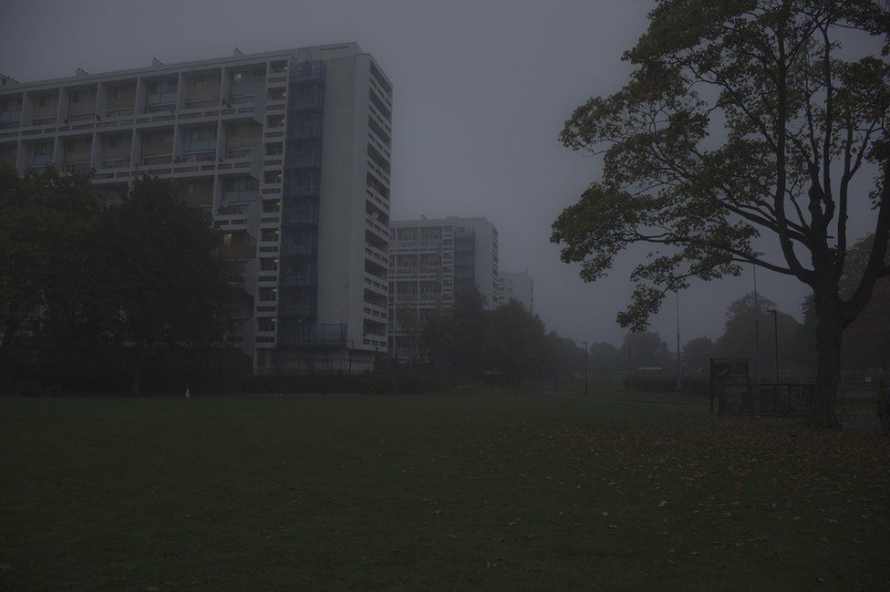 A misty view of nearby tower blocks