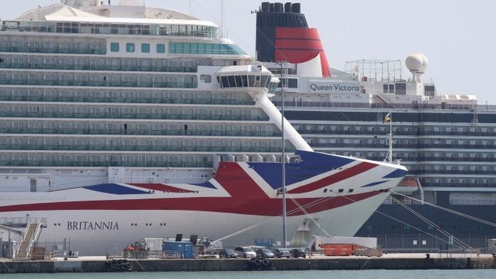 The P&O cruise ship Britannia (left) and the Cunard cruise ship Queen Victoria