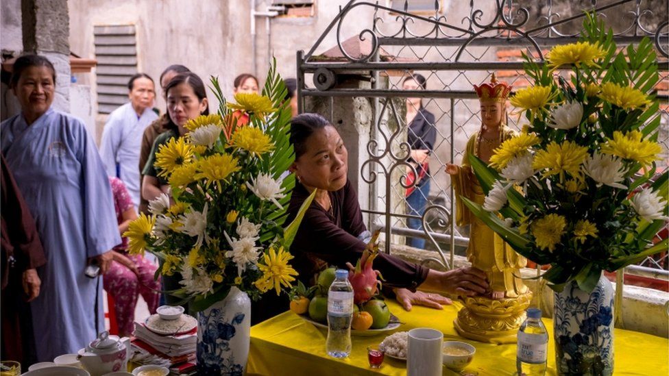 Relatives of the victims of the Essex lorry incident at a Buddhist prayer ceremony in Vietnam