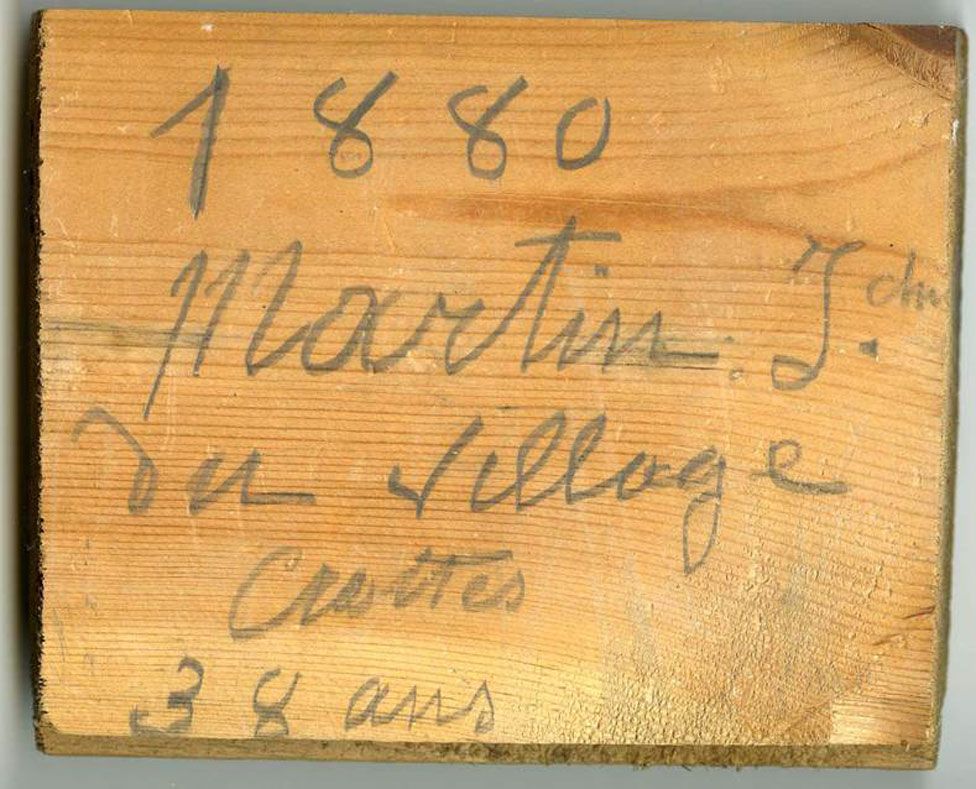 Inscription on parquet floor board